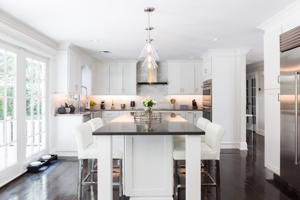 Cabinet section divider — bright white shaker kitchen