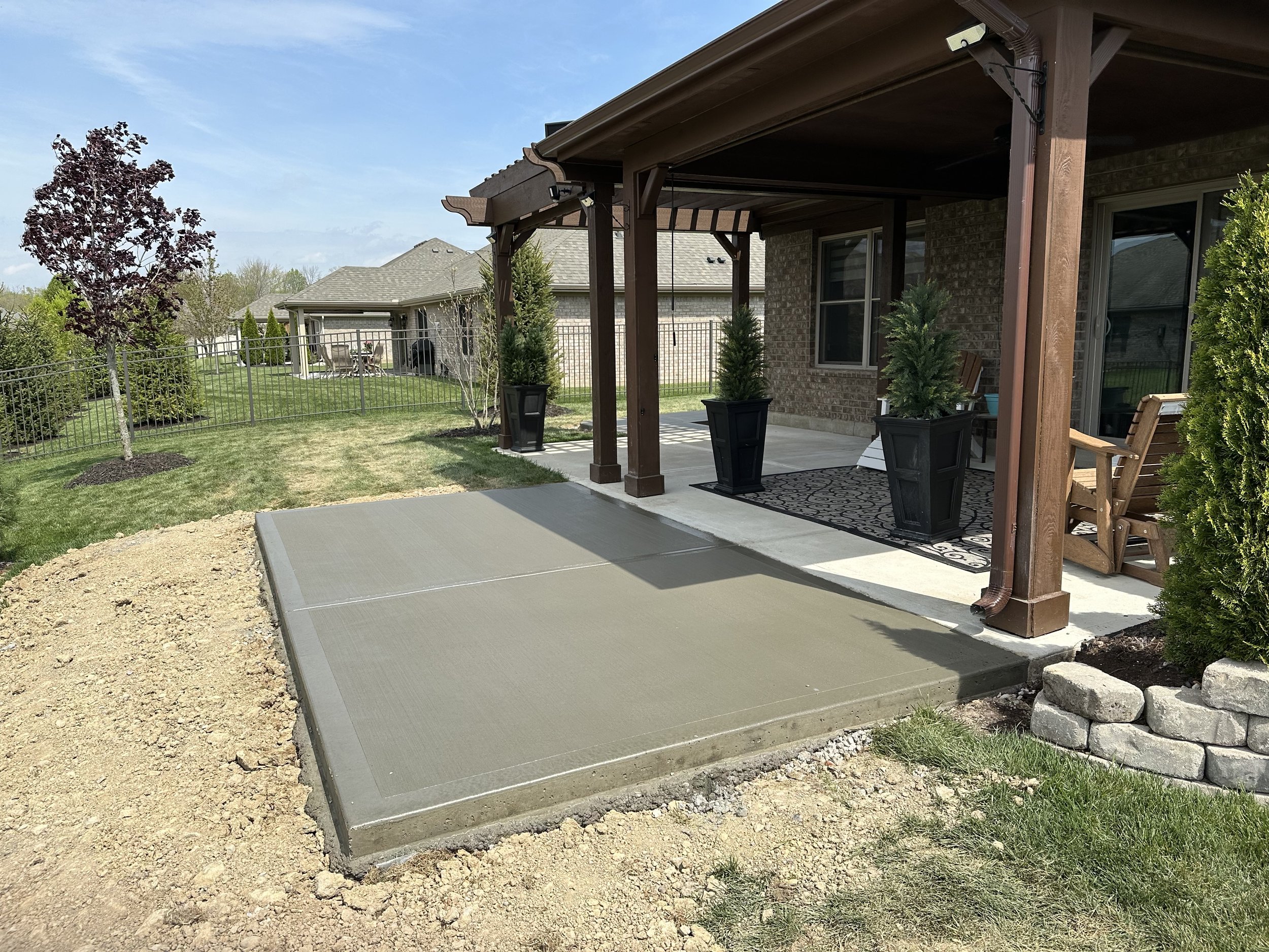 Finished patio extension seamlessly matched to the original slab in Lebanon, Ohio