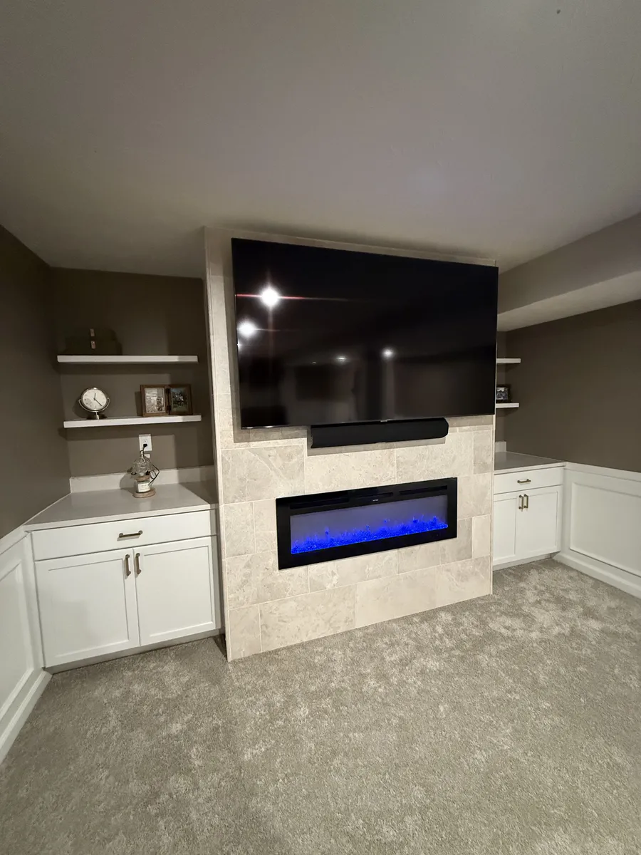 Built-In TV with Stone Fireplace