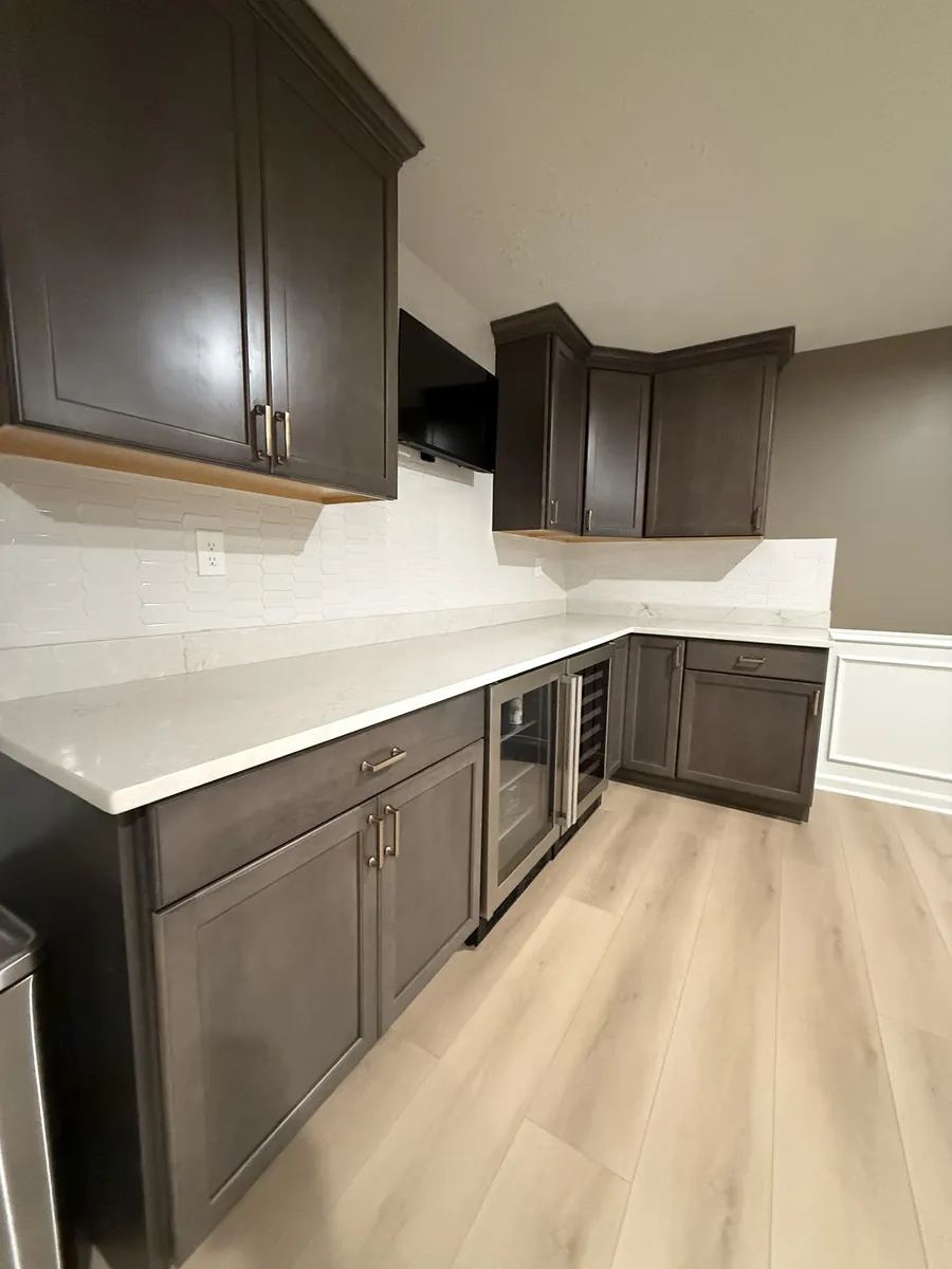 Dark Cabinet Kitchenette with Cooktop