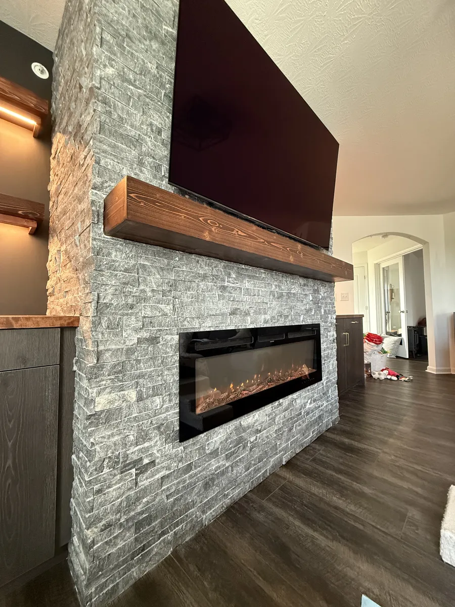 Stacked Stone Bar with Linear Fireplace