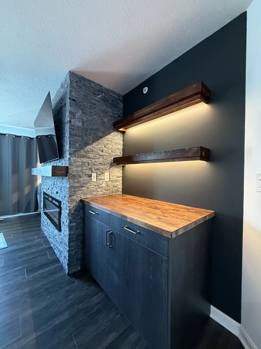 Stone Accent Wall with Wood Beams