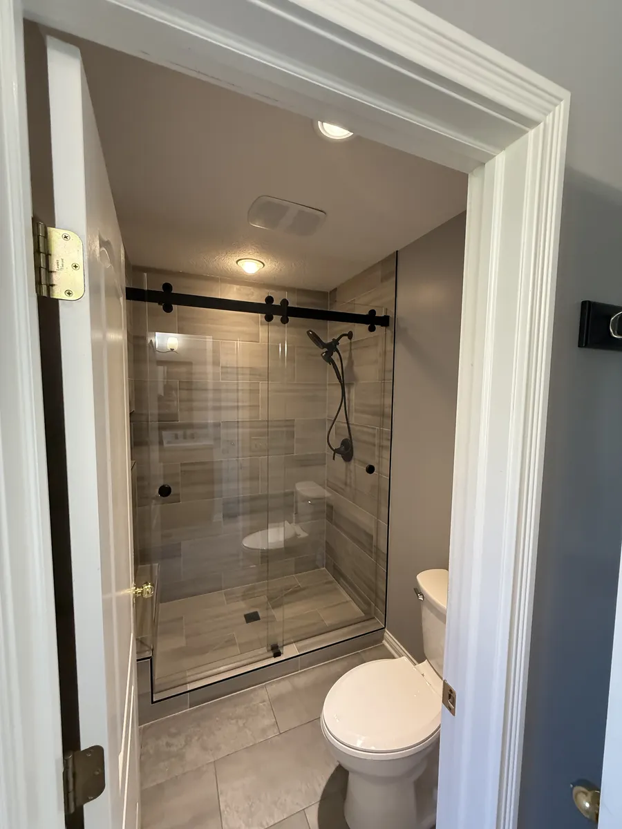 Walk-In Shower with Black Hardware