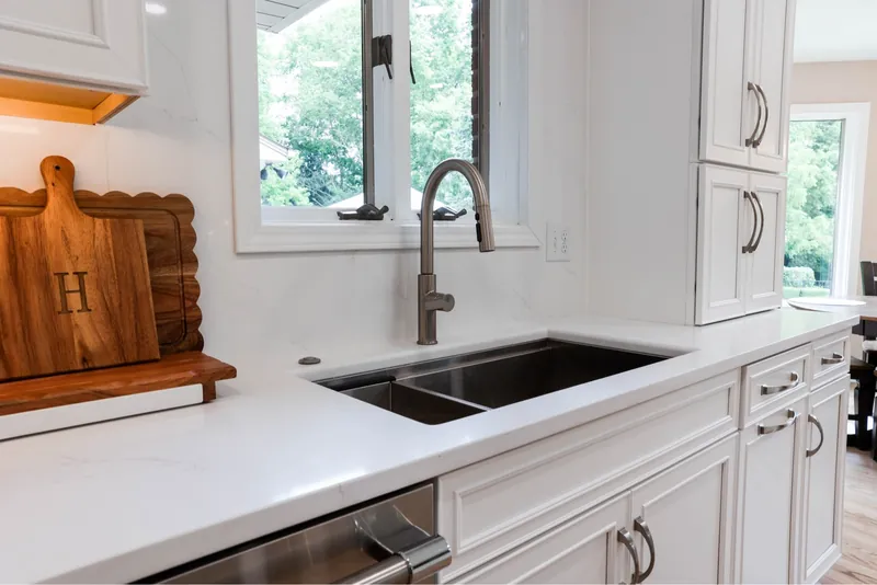White Quartz Kitchen with Marble Backsplash