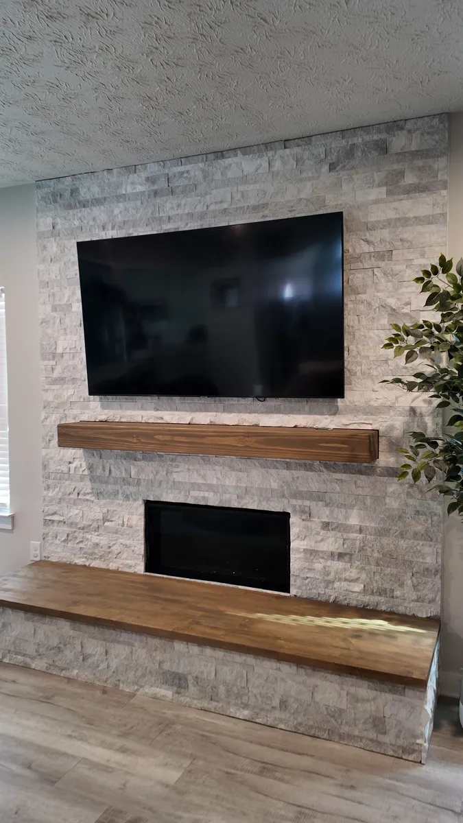 Stacked Stone Fireplace with Wood Mantel